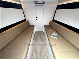 Interior of 2024 VanDutch 32 Diesel yacht with beige seating and modern design.