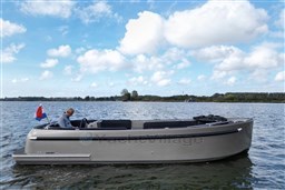 Seafury Hawker 725 boat on a calm lake, 2020 model, with a person onboard.