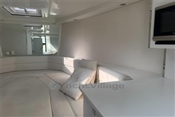 Luxurious interior of 2017 VanDutch 40 yacht with white seating and modern design.