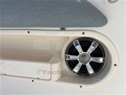 Speaker and storage compartment on 2005 Boston Whaler 320 Outrage boat.