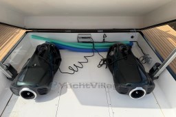 Storage compartment of 2022 Pardo Yachts P43 with water scooters and pool noodles.