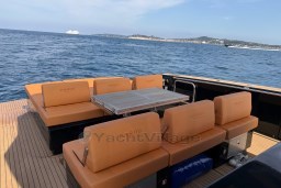 Luxurious 2022 Pardo Yachts P43 with elegant seating, cruising on serene blue waters.