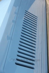 Close-up of a blue 2004 Wally 45 yacht's sleek, vented deck design.