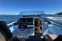 Cockpit view of a 2004 Wally 45 yacht on a sunny day at sea.