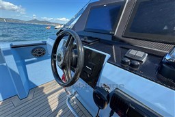 Steering console of 2004 Wally 45 yacht with navigation screens and controls.