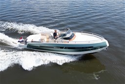 2023 Invictus GT 280 boat cruising on open water, showcasing sleek design and performance.