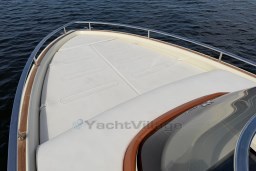 2023 Invictus GT 280 boat deck with sleek design on calm water.