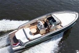 2023 Invictus GT 280 luxury boat cruising on water, featuring sleek design and spacious deck.