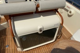 2023 Invictus GT 280 boat interior with cushioned seating and wooden flooring.
