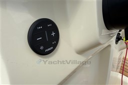 Control panel on 2023 Invictus GT 280 boat, featuring Fusion audio system.
