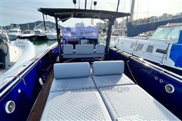 2017 Fjord 36' Open yacht with luxurious seating in a marina setting.