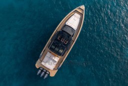 Aerial view of 2026 Pardo Yachts P43R on clear blue water.