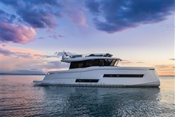2025 Pardo Yachts Endurance 60 cruising at sunset on calm waters.
