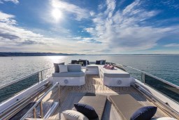 Luxurious 2025 Pardo Yachts Endurance 60 on serene ocean with sunlit deck.