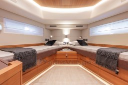 Luxurious cabin interior of 2025 Pardo Yachts Endurance 60 with twin beds and modern design.