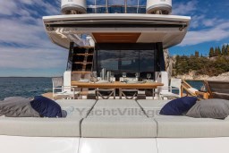 Luxurious 2025 Pardo Yachts Endurance 60 with elegant outdoor dining and sunbathing area.