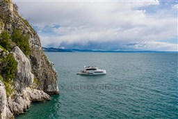 Luxury Pardo Yachts Endurance 60, 2025 model, cruising near rocky coastline.