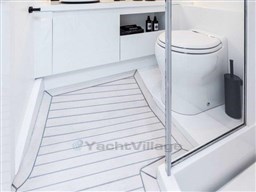 Modern bathroom in 2025 VanDutch 56 yacht with sleek design and white fixtures.