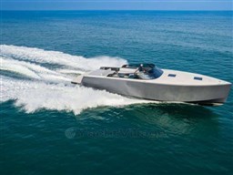 2025 VanDutch 56 yacht cruising on open sea, showcasing sleek design and powerful performance.