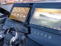 2025 VanDutch 56 yacht dashboard with dual Garmin displays and control panel.