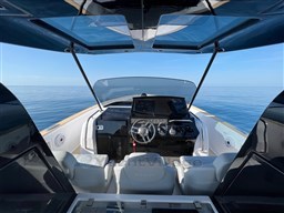 2023 Pardo Yachts 38 cockpit with modern helm, sleek design, and panoramic ocean view.