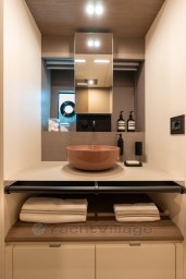 Luxurious bathroom in 2025 Pardo Yachts Endurance 72, featuring modern sink and elegant design.