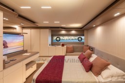Luxurious bedroom interior of 2025 Pardo Yachts Endurance 72 with modern design and ambient lighting.