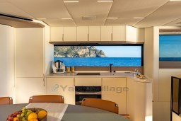 Luxurious kitchen interior of 2025 Pardo Yachts Endurance 72 with ocean view.