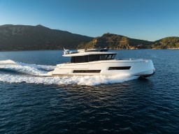 2025 Pardo Yachts Endurance 72 cruising on open water with scenic mountain backdrop.