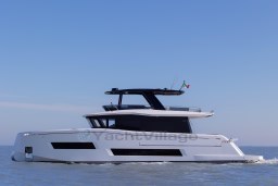 2025 Pardo Yachts Endurance 72 cruising on open water under clear blue sky.