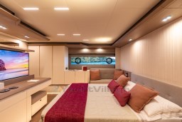 Luxurious bedroom interior of 2025 Pardo Yachts Endurance 72 with modern design and ambient lighting.