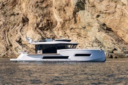 2025 Pardo Yachts Endurance 72 cruising near rocky coastline.