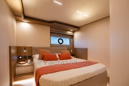 Luxurious bedroom interior of 2025 Pardo Yachts Endurance 72 with modern design and cozy lighting.