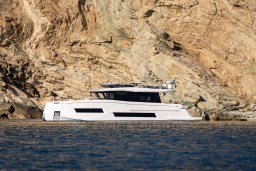 Luxury Pardo Yachts Endurance 72, 2025 model, cruising near rocky coastline.