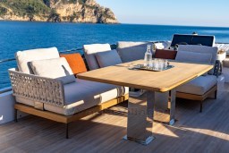 Luxurious outdoor seating on 2025 Pardo Yachts Endurance 72, overlooking serene ocean view.