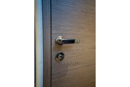 Wooden door with sleek chrome handle on 2026 Pardo Yachts 43 model.