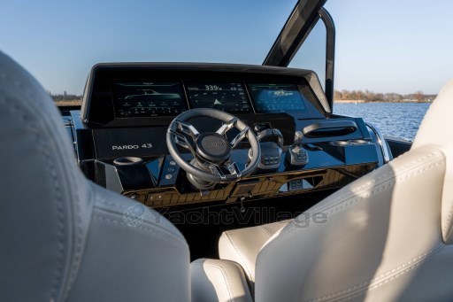 2026 Pardo Yachts 43 helm with modern controls and digital displays on open water.