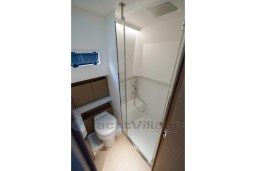 Modern bathroom in 2026 Pardo Yachts 43, featuring shower and toilet.