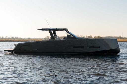 2026 Pardo Yachts 43 cruising on calm waters at sunset.