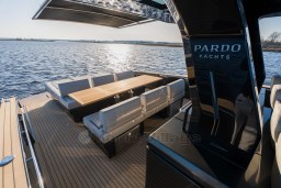 Luxurious 2026 Pardo Yachts 43 with elegant deck seating and scenic water view.