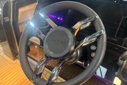 Steering wheel of 2026 Pardo Yachts 43, showcasing sleek design and modern controls.