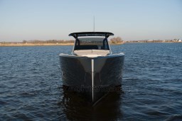 Front view of 2026 Pardo Yachts 43 on calm water under clear sky.