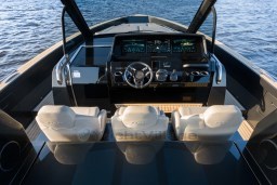 Cockpit view of 2026 Pardo Yachts 43, featuring modern navigation displays and luxurious seating.