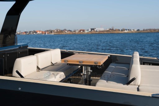 Luxurious seating area on 2026 Pardo Yachts 43, with scenic waterfront view.