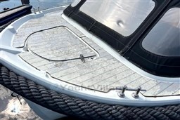 Corsiva 690 Tender 2012 boat deck with rope and canopy details.