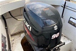 Suzuki 90 outboard motor on 2012 Corsiva 690 Tender boat.
