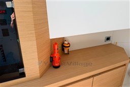 Interior of 2022 Pardo Yachts 38 with safety equipment on wooden surface.