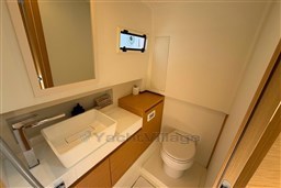 Luxurious bathroom interior of 2022 Pardo Yachts 38, featuring modern sink and toilet.