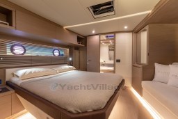Luxurious bedroom interior of 2025 Pardo Yachts GT 52, featuring modern design and ambient lighting.