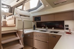Modern kitchen interior of 2025 Pardo Yachts GT 52, featuring sleek cabinetry and appliances.